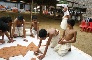 Children arranging a miniature Eagle Altar