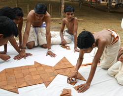 Children arranging the miniature Eagle Altar